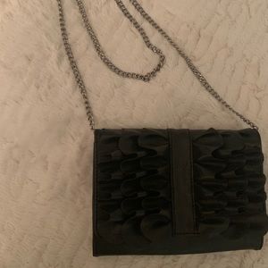 Black ruffled crossbody bag